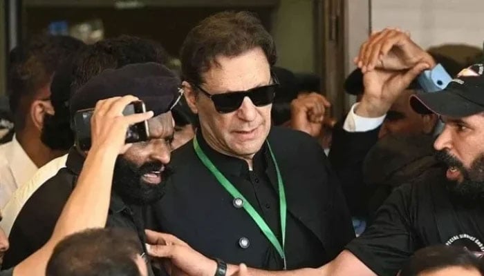 PTI founder Imran Khan leaves after appearing in the Supreme Court in Islamabad on July 24, 2023. — AFP