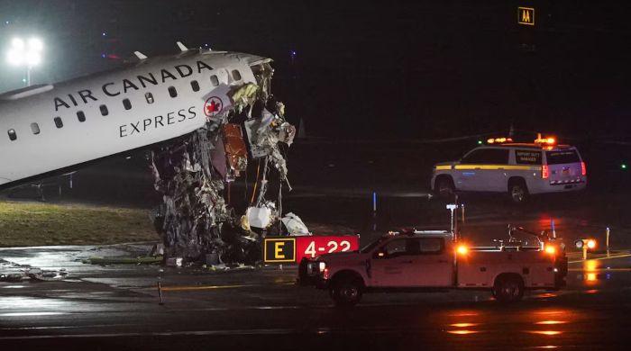 Pilot, co-pilot killed after passenger jet hits ground fire truck at New York's LaGuardia airport