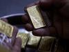 Gold prices post record single-day drop amid global downturn