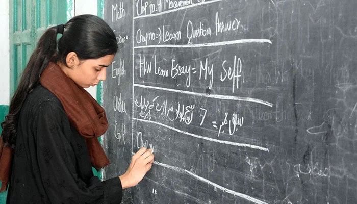 A teacher takes a class at a school in Lahore. — Online/File