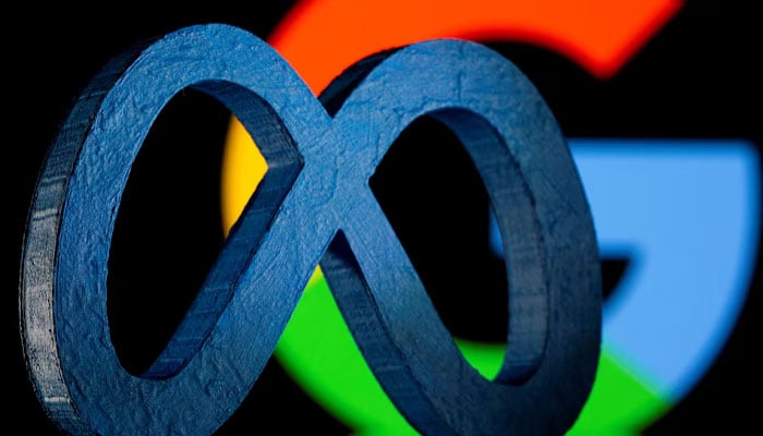 A 3D printed Meta logo is seen in front of displayed Google logo in this illustration taken on November 2, 2021. — Reuters