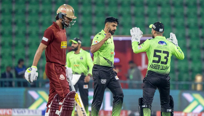 Lahore Qalandars Haris Rauf (centre) celebrates with teammates after taking a wicket during the Pakistan Super League 11 match against Hyderabad Kingsmen at Gaddafi Stadium, Lahore, on March 26, 2026. — PSL