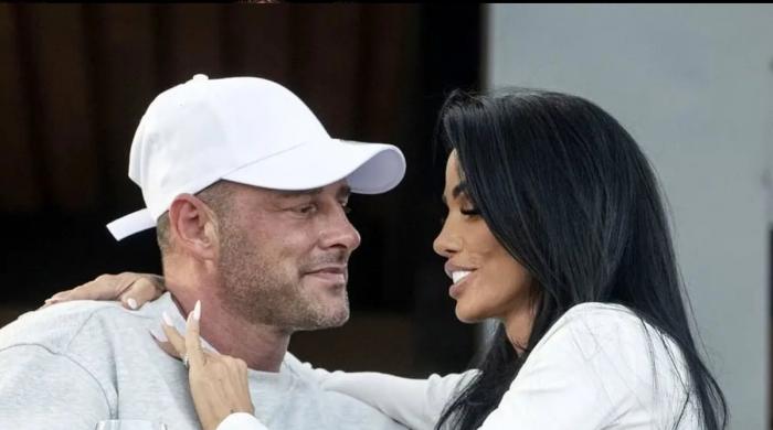 Katie Price shows off busty gym snap and diamond rings during Dubai trip