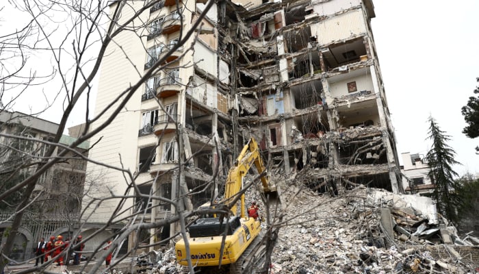 A view of a residential building damaged by a strike, amid the US-Israeli conflict with Iran, in Tehran, Iran, March 23, 2026. — Reuters