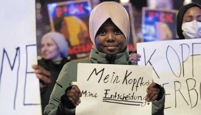 Hadiya, an 11-year-old student, attends a protest, organised by coalition of 20 civil society organisations in Austria, against the headscarf ban in schools, in Vienna, Austria, on February 13, 2026. — AFP