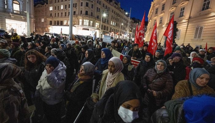 Hundreds of demonstrators attend a protest, organised by coalition of 20 civil society organisations in Austria, against the headscarf ban in schools, in Vienna, Austria, on February 13, 2026. — AFP