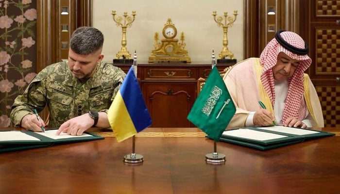 Saudi Arabian Assistant Minister of Defence for Executive Affairs Dr Khaled Al-Biyari (right) and Ukrainian Chief of the General Staff of the Armed Forces Lieutenant General Andrii Hnatov sign memorandum of understanding related to defense procurement arrangements in Jeddah. — SPA
