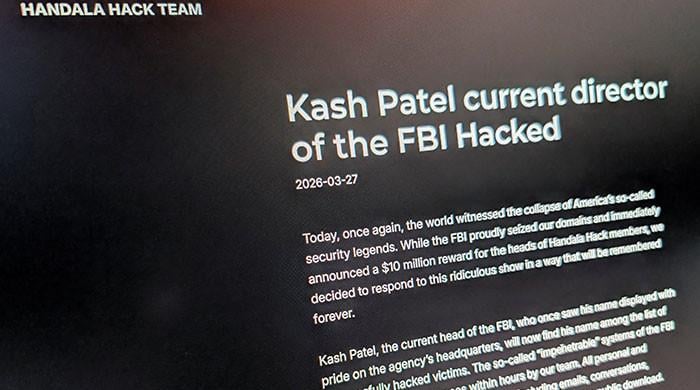Iran-linked hackers breach FBI director's personal email, publish photos and documents