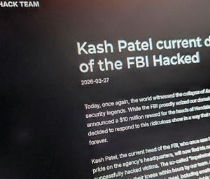 Iran-linked hackers breach FBI director's personal email, publish photos and documents