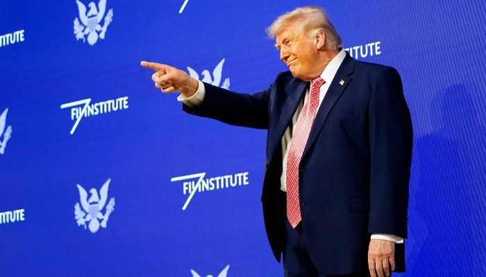 US President Donald Trump gestures to the crowd before speaking at the FII PRIORITY Summit at the Faena Hotel on March 27, 2026 in Miami Beach, Florida, US. — AFP
