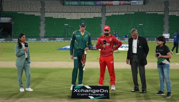 Multan Sultans Ashton Turner (second from left) and Islamabad United captain Shadab Khan at the toss for their PSL 11 match at the Gaddafi Stadium in Lahore on March 28, 2026. — X/@thePSLt20