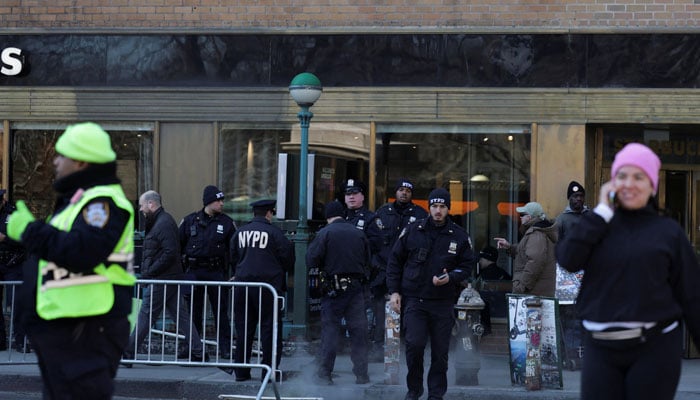 NYPD police officers stand guard on the day of a No Kings protest against US President Donald Trumps administration policies, in New York City, New York, US, March 28, 2026. — Reuters