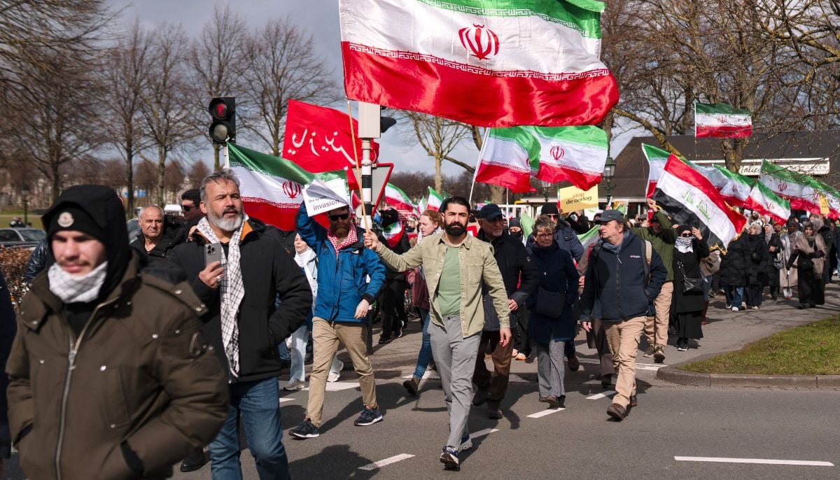 Demonstrators with flags of Iran near the Malieveld take part in a rally called ´Stop the war against Iran!´ against the military attacks by the United States and Israel on Iran, in The Hague on March 28, 2026. — AFP