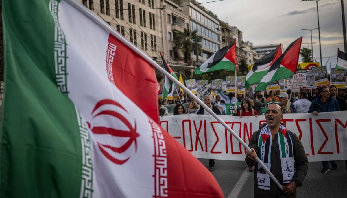 People participate in a demonstration against the Middle East war and in solidarity with the Palestinian people, entitled No Kings, in central Athens on March 28, 2026. — AFP