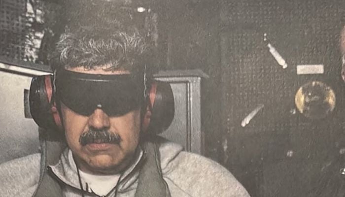 A photograph which US President Donald Trump posted on his Truth Social account shows what he describes as Venezuelan President Nicolas Maduro on board the USS Iwo Jima amphibious assault ship, currently in the Caribbean Sea, January 3, 2026. — Reuters