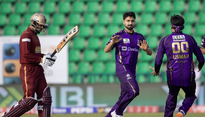 Quetta Gladiators Abrar Ahmed (centre) celebrates with teammate Usman Tariq (right) after claiming wicket of Hyderabad Kingsmens Usman Khan in their Pakistan Super League 11 match at Gaddafi Stadium, Lahore, on March 29, 2026. — PSL