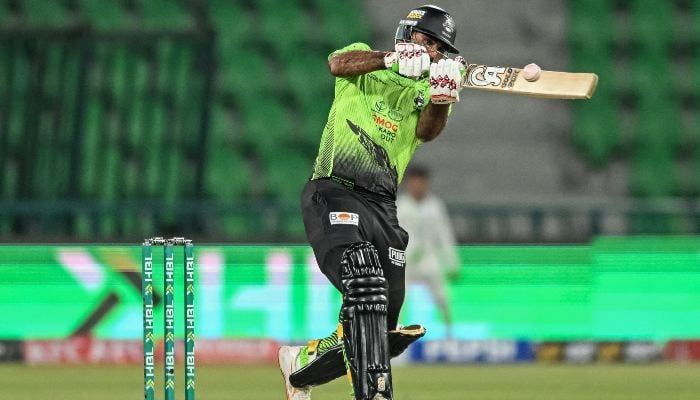Lahore Qalandars Fakhar Zaman plays a shot during the Pakistan Super League (PSL) Twenty20 match between Lahore Qalandars and Hyderabad Kingsmen at Gaddafi Stadium in Lahore on March 26, 2026. — AFP