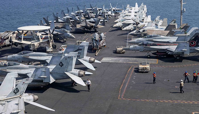 US Navy and US Marine Corps aircraft attached to Carrier Air Wing (CVW) 9 are arrayed on the flight deck of the Nimitz-class aircraft carrier USS Abraham Lincoln during the Operation Epic Fury attack on Iran from an undisclosed location March 10, 2026. — Reuters