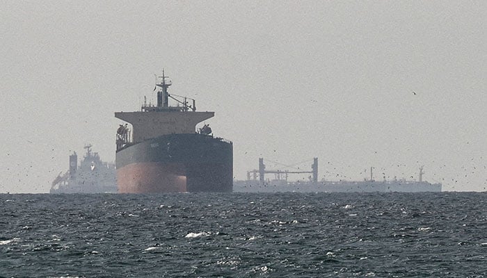 Cargo ships in the Gulf, near the Strait of Hormuz, as seen from northern Ras al-Khaimah, near the border with Oman’s Musandam governance, amid the US-Israeli conflict with Iran, in United Arab Emirates, March 11, 2026. — Reuters