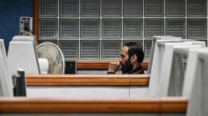 PSX falls as oil surge, bond yields rattle investors