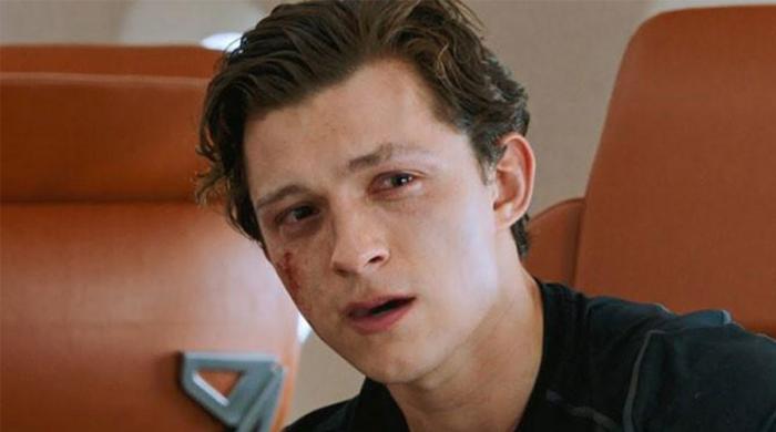 Tom Holland explains why he keeps his distance from Hollywood
