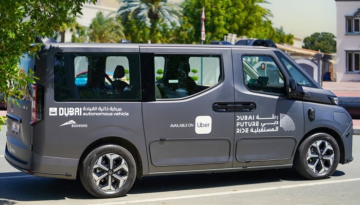 An autonomous taxi stands parked in a commercial area in Dubai. — X@DXBMediaOffice