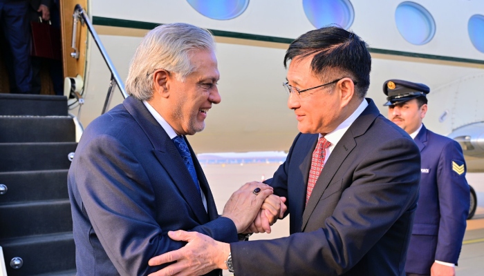 Chinas Special Envoy for Afghan Affairs Yue Xiaoyong (right) receives Deputy Prime Minister and Foreign Minister Ishaq Dar upon arrival in Beijing, China, March 31, 2026. — X/@ForeignOfficePk