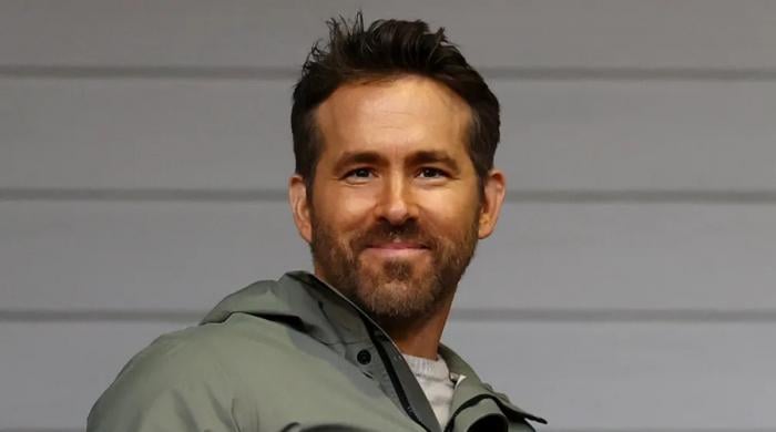 Fans make Ryan Reynolds bid $25k for hat at auction