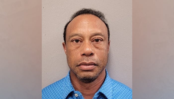 Tiger Woods is shown in a police booking mugshot released by the Martin County Sheriffs Office on March 28, 2026, as he was released from jail after posting bail, following his arrest on suspicion of DUI in relation to a rollover crash in Jupiter Island, in Stuart, Florida, US. — Reuters