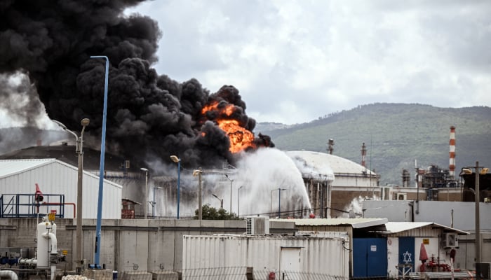 A blaze after Israels Fire and Rescue Service said that an industrial building and a fuel tanker at Israels Oil Refineries were hit by debris from an intercepted Iranian missile, amid the US-Israel conflict with Iran, in Haifa, Israel March 30, 2026. — Reuters
