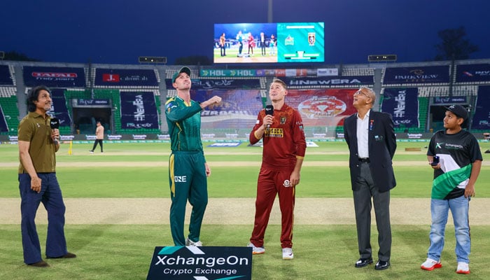Multan Sultans captain Ashton Turner (second from left) and Hyderabad Kingsmen captain Marnus Labuschagne (centre) during the toss for the Pakistan Super League 11s eighth match at Gaddafi Stadium, Lahore, on April 1, 2026. — PSL