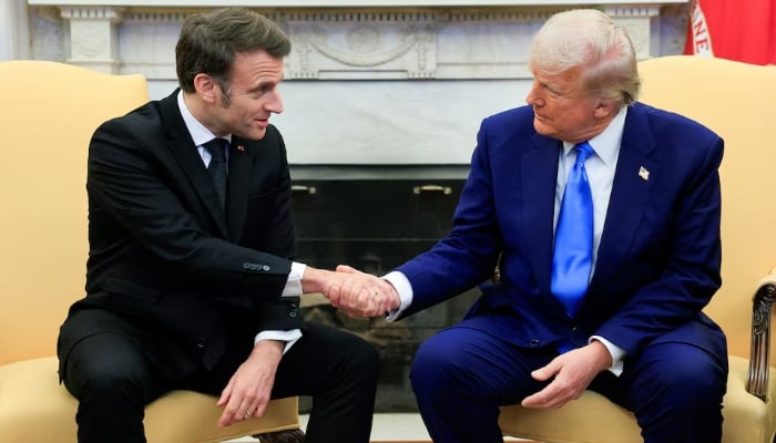 US President Donald Trump shakes hands with French President Emmanuel Macron at the White House in Washington, DC, US, February 24, 2025. — Reuters