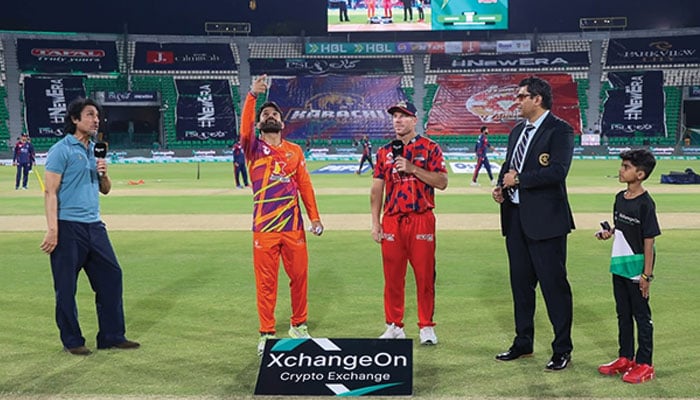 RawalPindiz captain Mohammad Rizwan (second from left) and Karachi Kings David Warner (centre) at the toss for their PSL 11 match at the Gaddafi Stadium in Lahore on April 2, 2026. — PSL