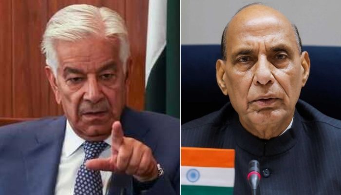 Defence Minister Khawaja Asif (left) and his Indian counterpart Rajnath Singh.  — Reuters