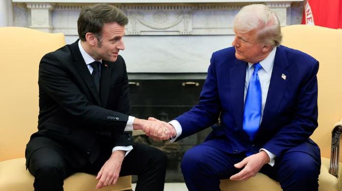 Trump takes a dig at Macron, saying wife treats him 'badly'
