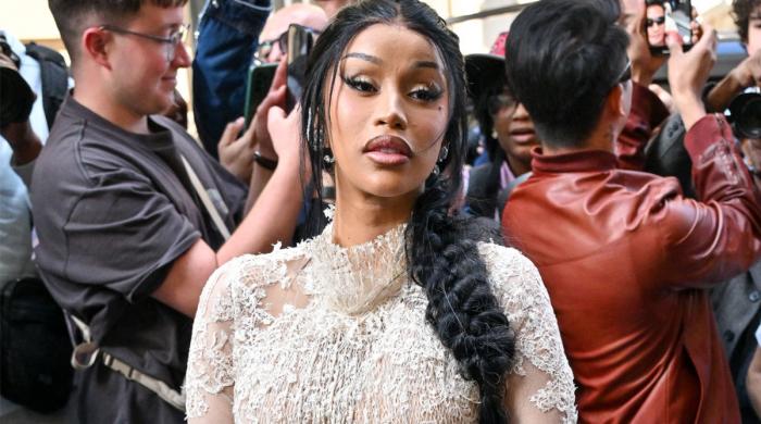 Cardi B says she's not competing with Beyoncé or Rihanna