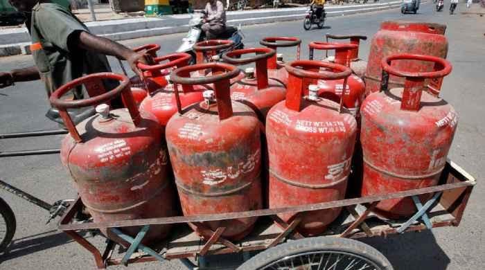 India graveyard raid uncovers hidden cooking gas canisters amid shortage