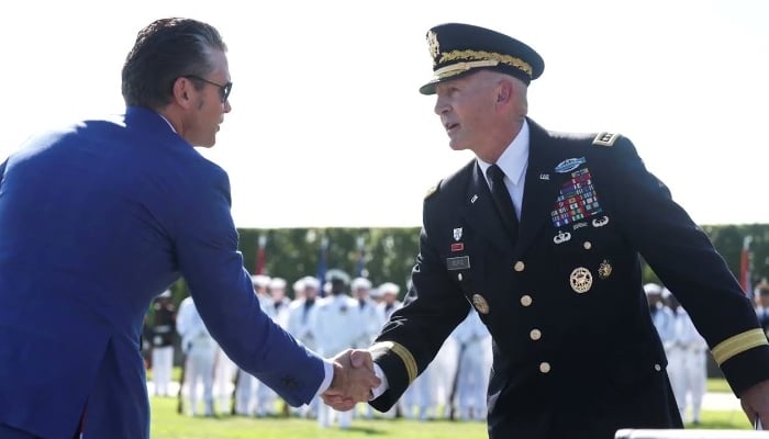 Defence Secretary Pete Hegseth shakes hands with General Randy George, Chief of Staff of the US Army, in this still taken from a video. — Reuters