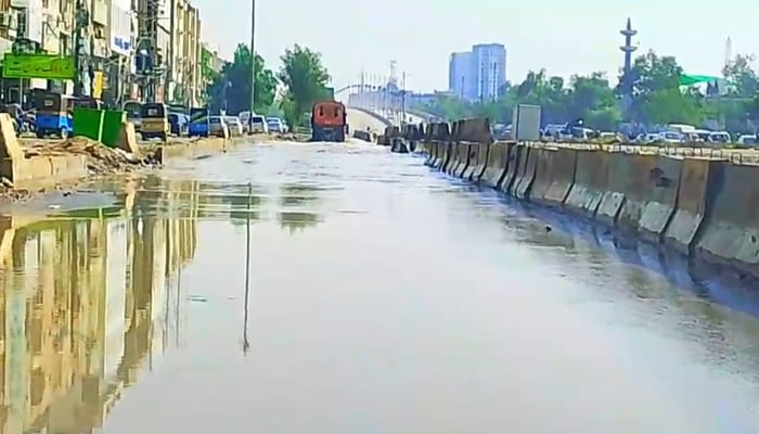 A screengrab taken from a video showing part of University Road near Nipa submerged in rain water on April 3, 2026. — Geo News