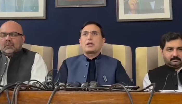PTI chairman Barrister Gohar Khan (centre) addresses a press conference in Islamabad, April 3, 2026. — Screengrab via YouTube/Pakistan Tehreek-e-Insaf