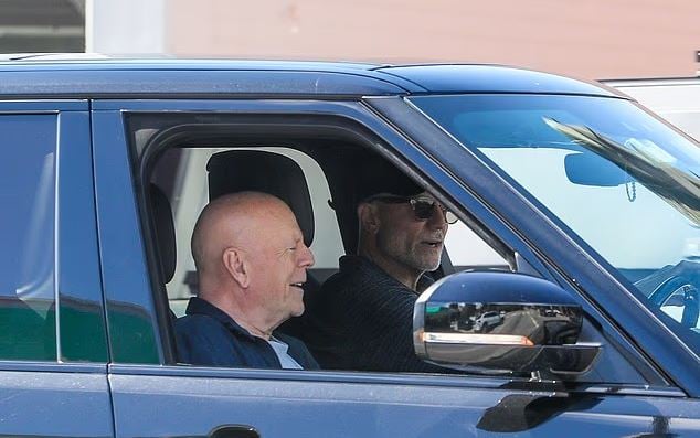 Bruce Willis smiles during rare LA outing amid dementia battle