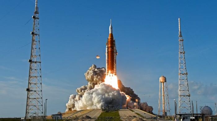 Artemis capsule boost puts astronauts moon-bound for record-breaking journey