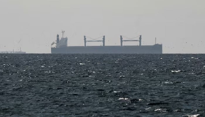 A cargo ship in the Gulf, near the Strait of Hormuz, as seen from northern Ras al-Khaimah, near the border with Oman’s Musandam governance, amid the US-Israeli conflict with Iran, in the United Arab Emirates, March 11, 2026. —Reuters