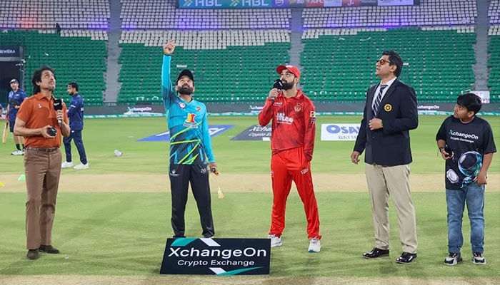Islamabad United captain Shadab Khan (centre) and RawalPindiz skipper Mohammad Rizwan (second from left) at the toss for their PSL 11 match at the Gaddafi Stadium in Lahore on April 4, 2026. — PSL