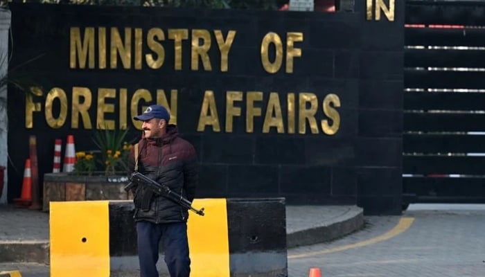 A Pakistani police officer stands guard outside the Ministry of Foreign Affairs in Islamabad on January 18, 2024. — AFP