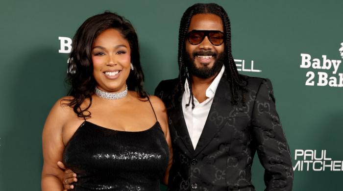 Inside Lizzo's sweet night out as she cheers on Myke Wright