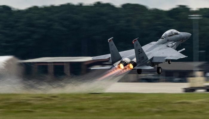 This handout photo provided by the US Air Force shows an F-15E Strike Eagle taking off for a training sortie at Seymour Johnson Air Force Base, North Carolina, on August 22, 2025. — AFP