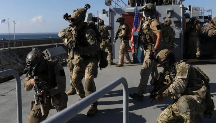 Members of the Special Operations Team of the Cypriot National Guard and US Navy Seals participate in a joint military training. — Reuters/File