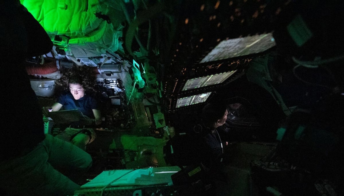 Nasa astronaut Christina Koch is illuminated by a screen inside the darkened Orion spacecraft on the third day of the agencys Artemis II mission as the crew travels towards the moon April 3, 2024. — Reuters