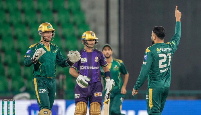 Multan Sultans Mohammad Nawaz (right) celebrates dismissing Quetta Gladiators Khawaja Nafay (centre) during their PSL 11 match at the Gaddafi Stadium in Lahore on April 5, 2026. — PSL